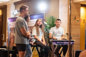 Group of people celebrating on stage