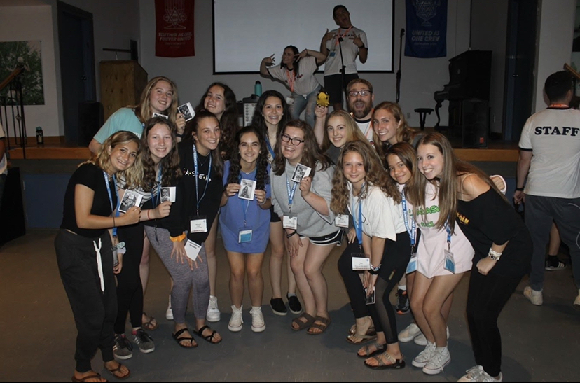 Group of people celebrating on stage