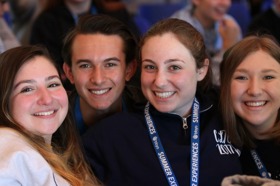 Group of people celebrating on stage