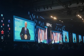 Group of people celebrating on stage