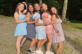 Group of people celebrating on stage