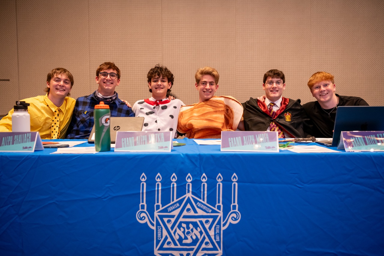 Group of people celebrating on stage