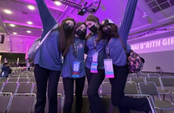 Group of people celebrating on stage
