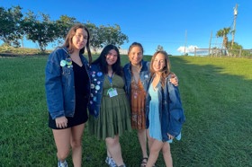 Group of people celebrating on stage
