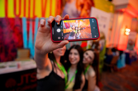 Group of people celebrating on stage