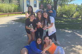 Group of people celebrating on stage