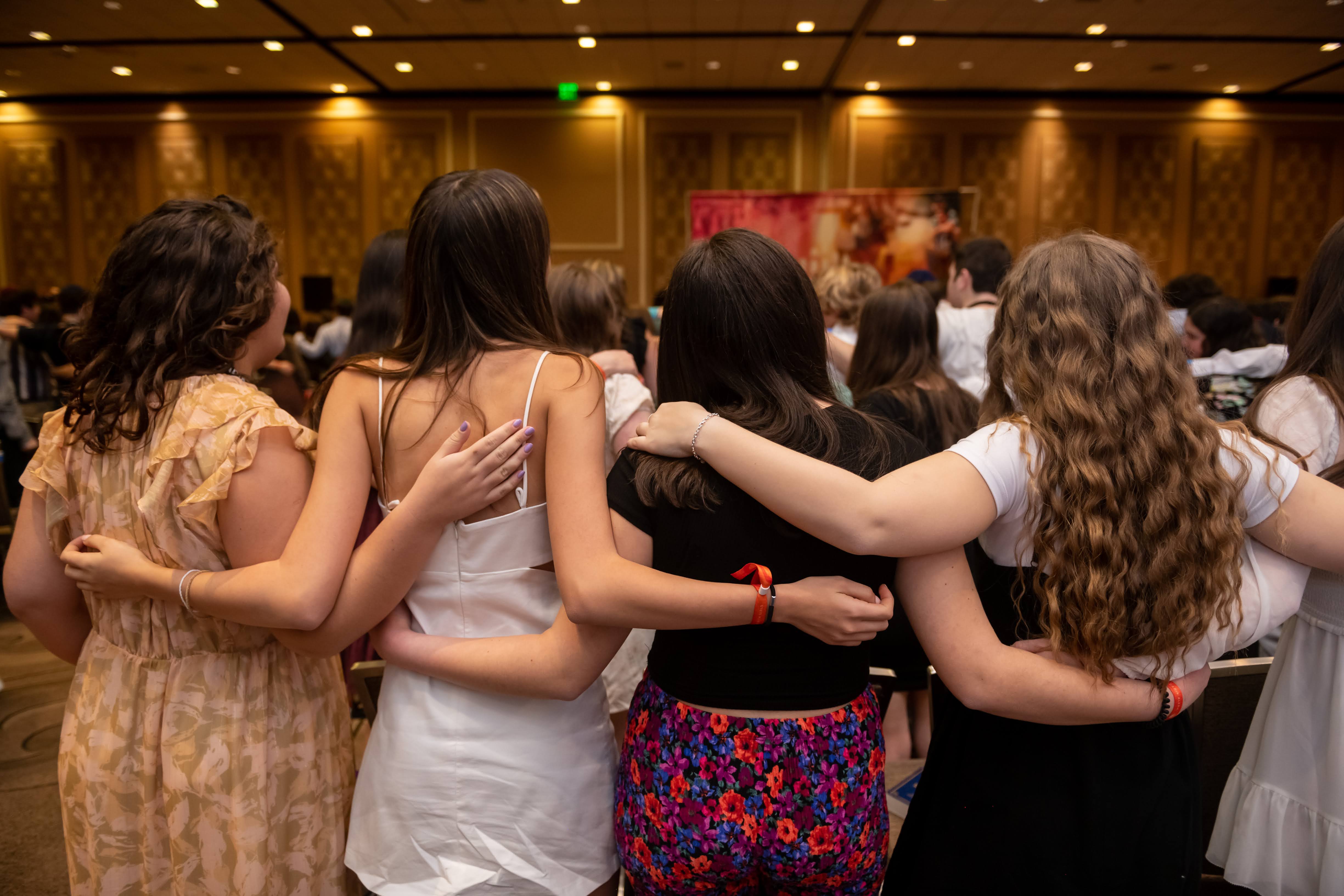 Group of people celebrating on stage