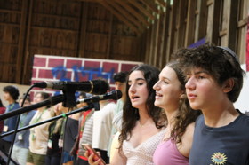 Group of people celebrating on stage