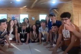 Group of people celebrating on stage