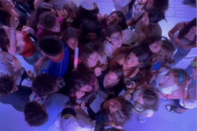 Group of people celebrating on stage