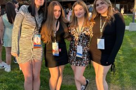 Group of people celebrating on stage