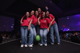 Group of people celebrating on stage