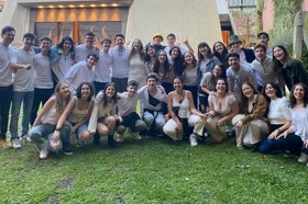 Group of people celebrating on stage