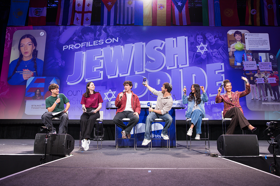 Group of people celebrating on stage