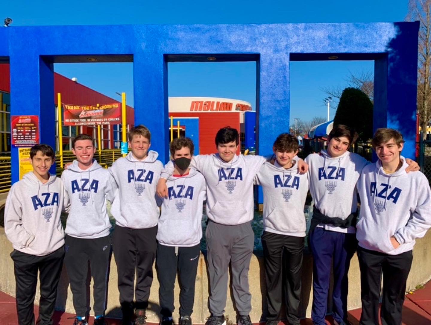 Group of people celebrating on stage