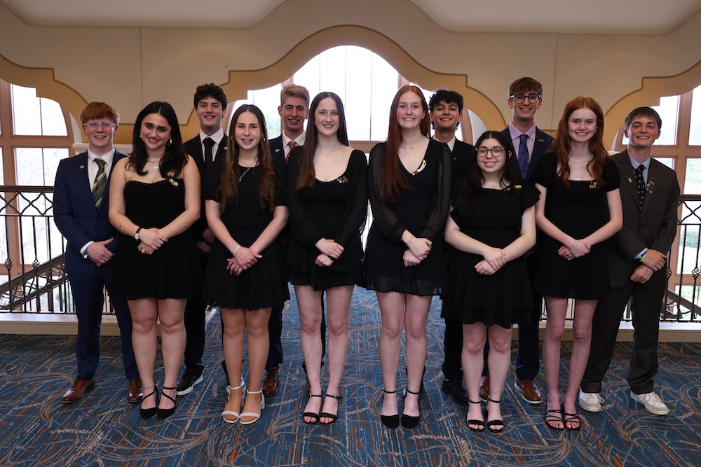 Group of people celebrating on stage