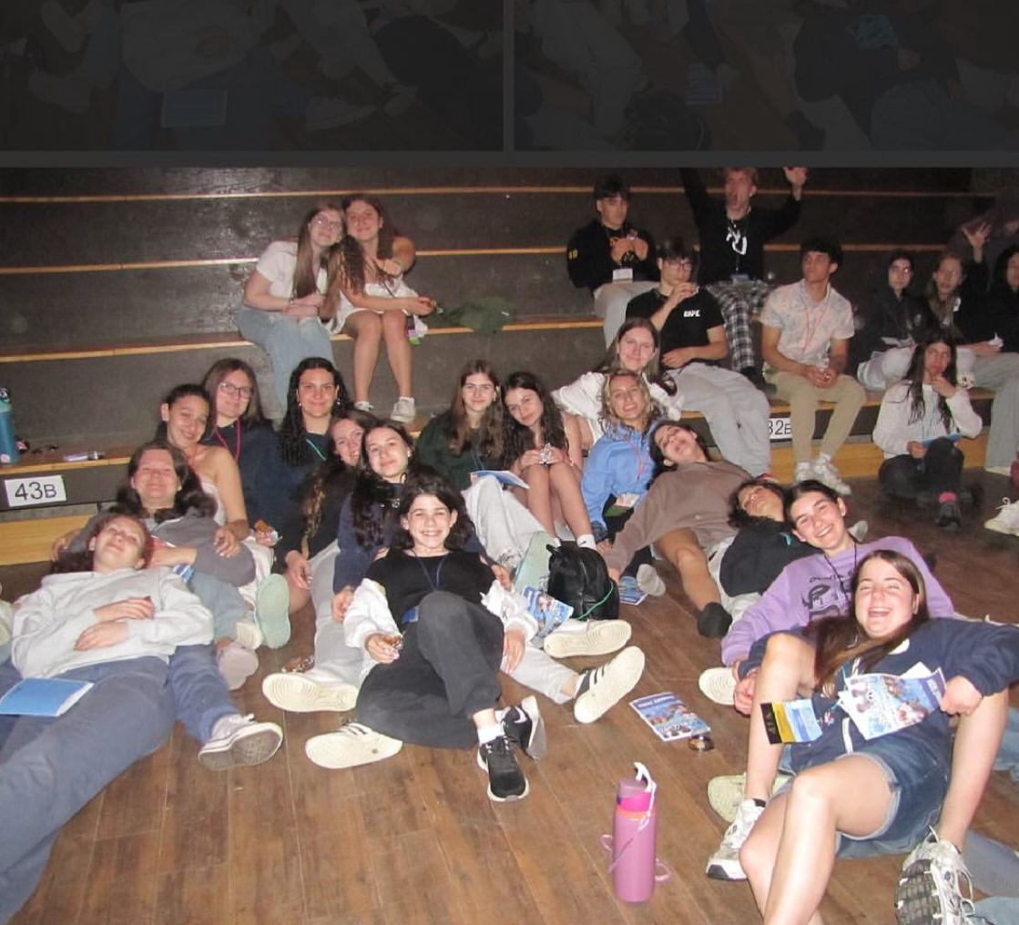 Group of people celebrating on stage