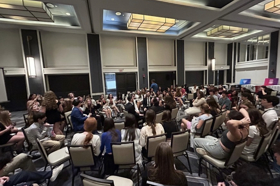Group of people celebrating on stage