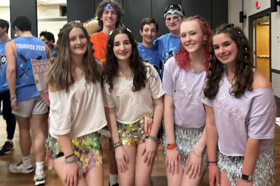 Group of people celebrating on stage