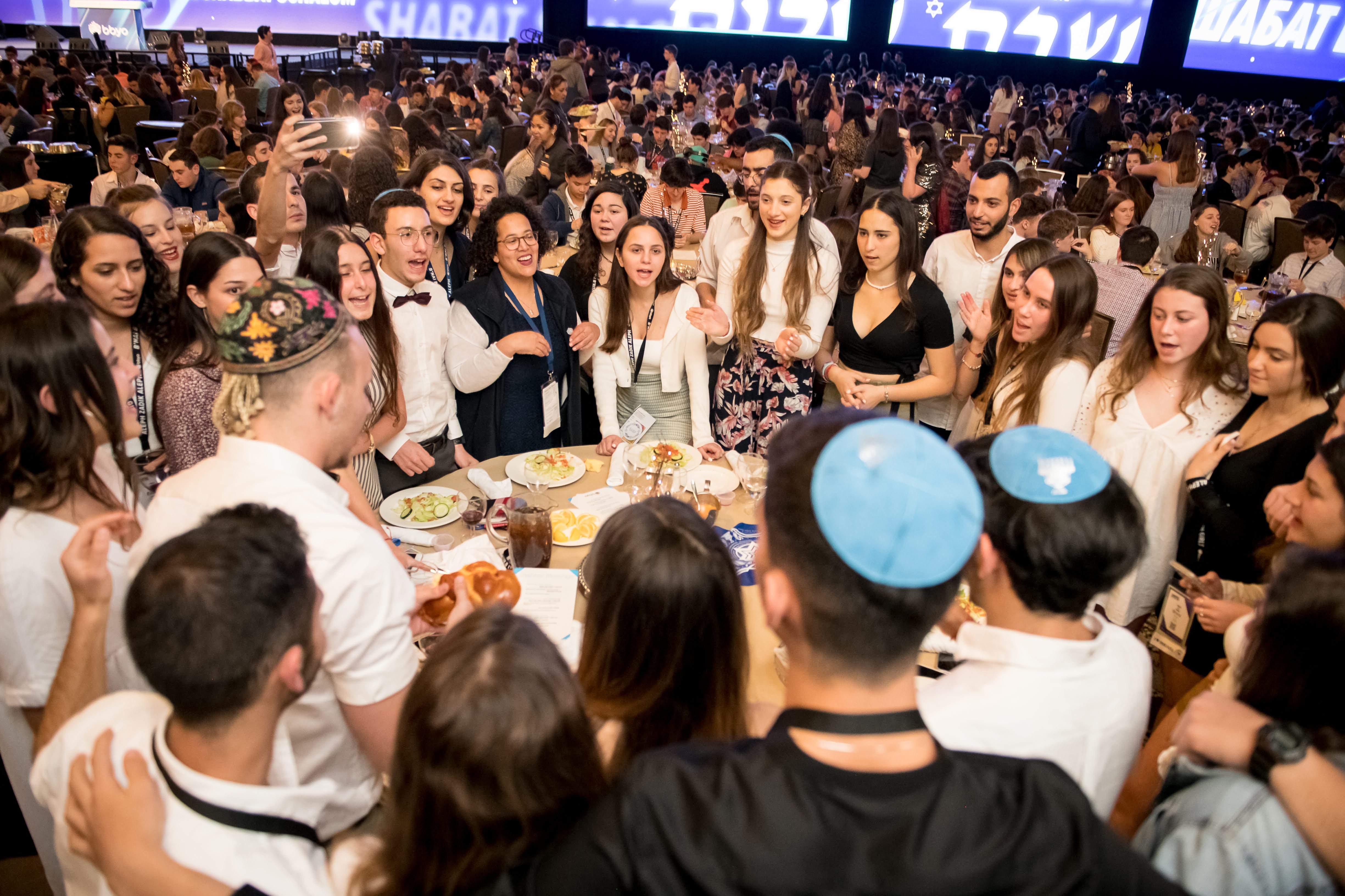 Group of people celebrating on stage