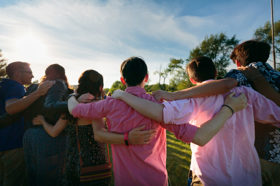 Group of people celebrating on stage