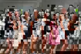 Group of people celebrating on stage