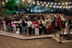 Group of people celebrating on stage