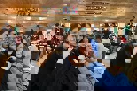 Group of people celebrating on stage