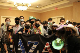 Group of people celebrating on stage