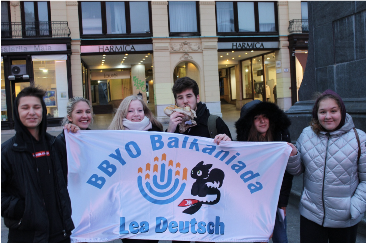 Group of people celebrating on stage