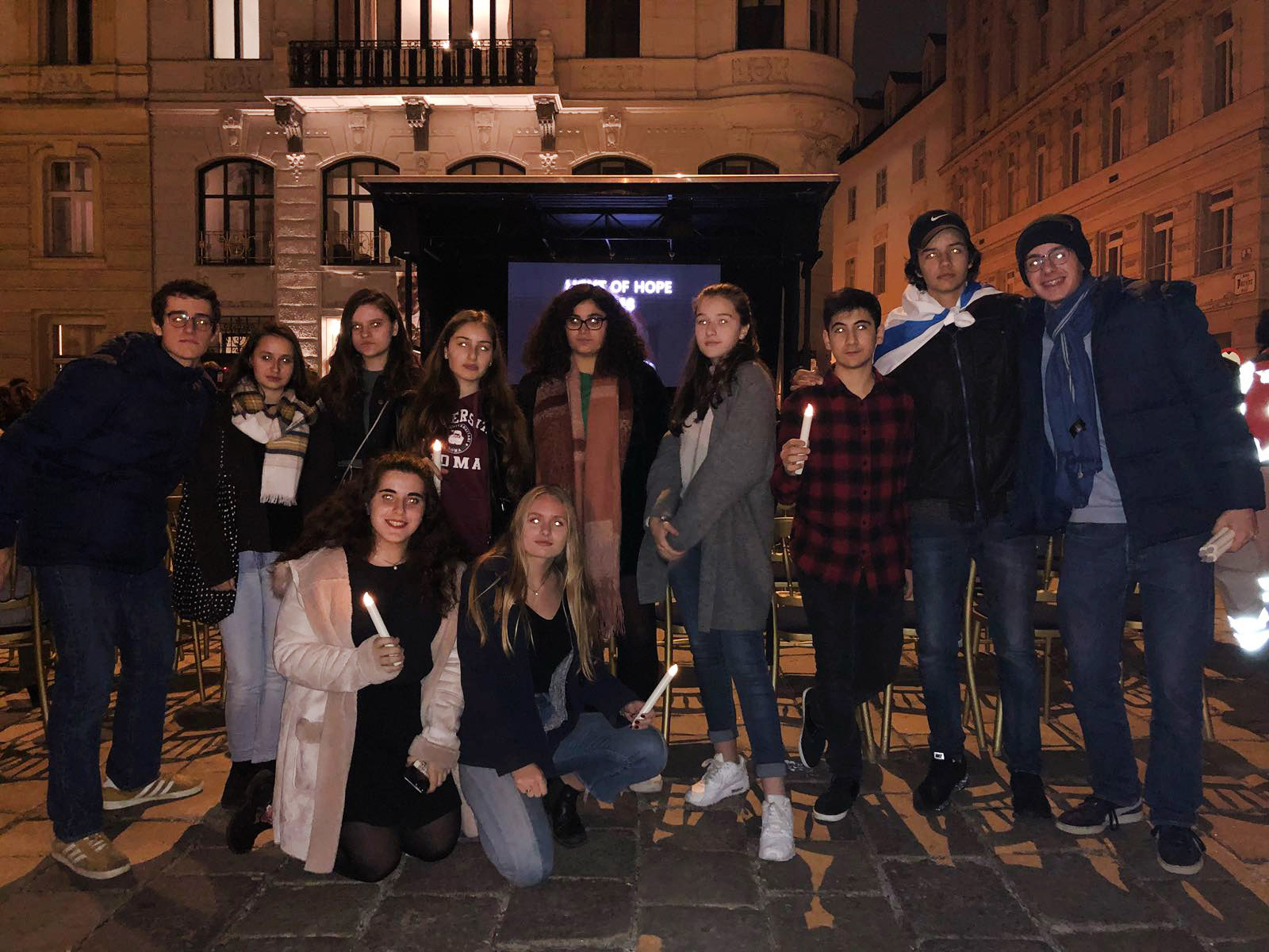 Group of people celebrating on stage