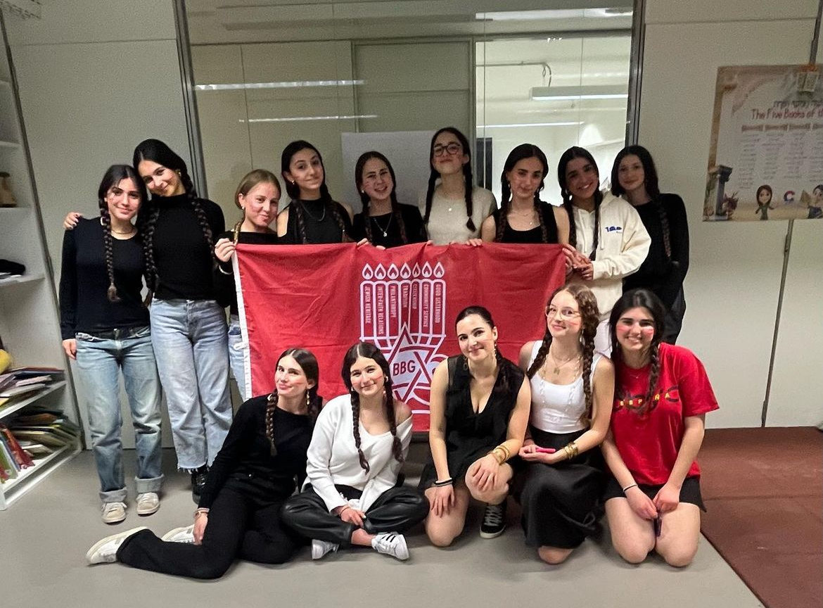 Group of people celebrating on stage