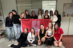 Group of people celebrating on stage