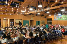 Group of people celebrating on stage