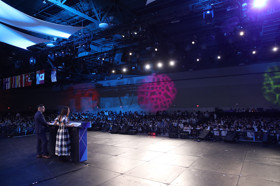 Group of people celebrating on stage
