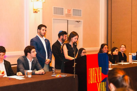 Group of people celebrating on stage