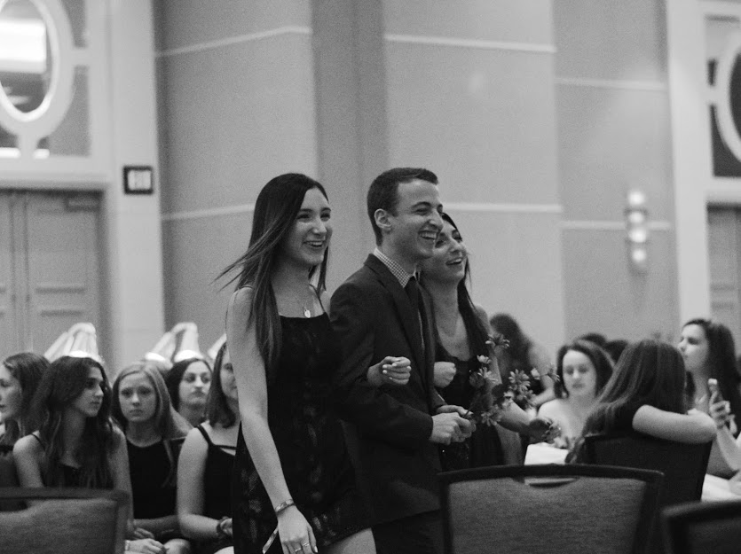 Group of people celebrating on stage