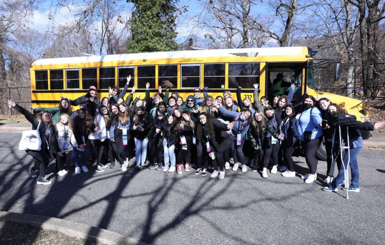 Group of people celebrating on stage