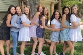 Group of people celebrating on stage