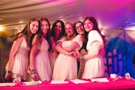 Group of people celebrating on stage