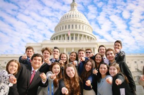 Group of people celebrating on stage